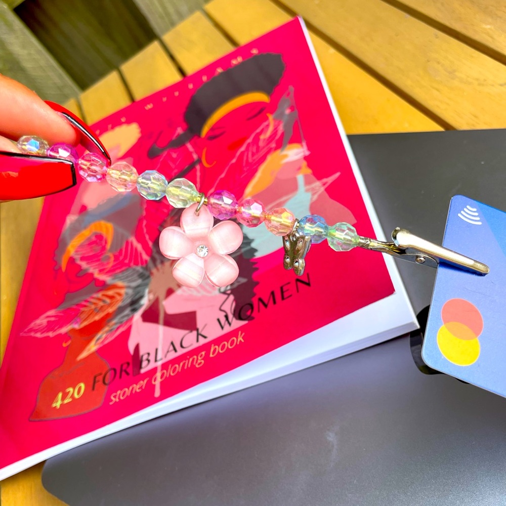 Multi-use debit/credit card holders, atm card grabbers, or roach clips/420.